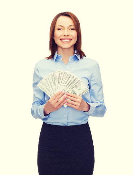 Young businesswoman with dollar - Фото, зображення