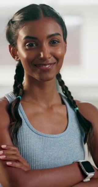 Woman, face and arms crossed in gym, fitness and smile with workout and healthy, wellness and happiness. Indian, female person and training at exercise club, confidence in portrait and sports. - Footage, Video