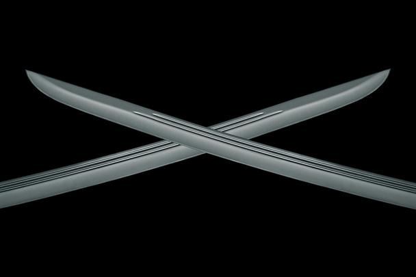 Two cross sabre blades on black - Fotografie, Obrázek