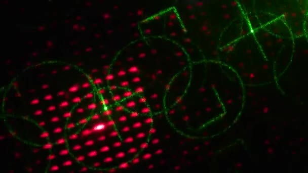 Blinkende und fliegende Animationsmuster roter und grüner Farben auf schwarzem Hintergrund - Filmmaterial, Video