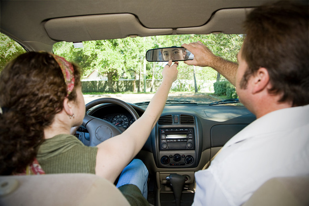 Teen Driver - Adjusting Mirror - Valokuva, kuva