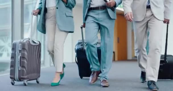 Airport, suitcase and legs of walking business people travel to destination, seminar or board airplane transport. Luggage, global journey or closeup team steps to plane booking, flight or immigration. - Footage, Video