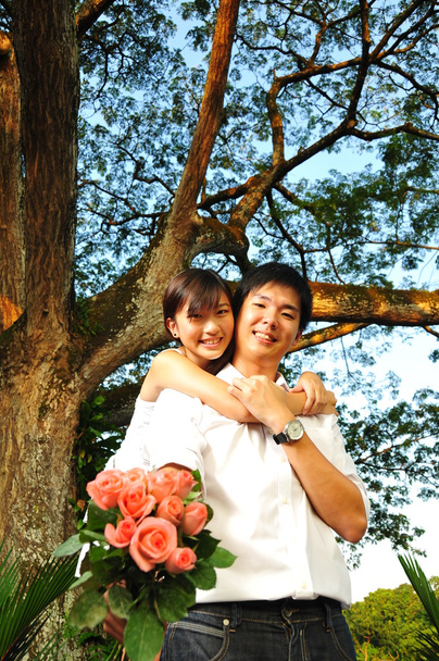 Asiático chinês casal em íntimos momentos ao ar livre
 - Foto, Imagem