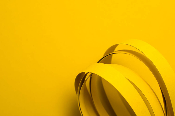 Curved stripes on yellow background - Photo, Image