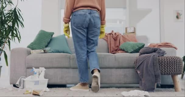 Housework, exhausted and woman cleaner on a sofa, stress and taking a break while spring cleaning a home. Fatigue, person and maid tired, disinfectant and overworked with supplies and daily chores. - Footage, Video