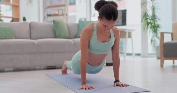 Exercise, yoga and woman stretching, meditation and workout for wellness, health and fitness in a living room. Person, home or athlete in a lounge, zen or peace with self care, stretch or flexibility. - Footage, Video