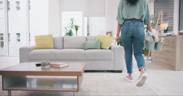 Cleaning, home and woman relax on sofa after housework for hygiene, disinfection and healthy apartment. Housekeeping, maid service and happy person rest on couch tired from washing, chores and tidy. - Video, Çekim