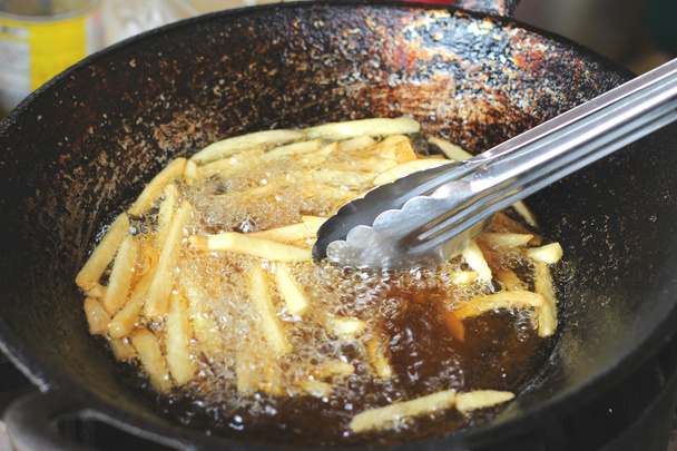 Patatine fritte in padella
 - Foto, immagini