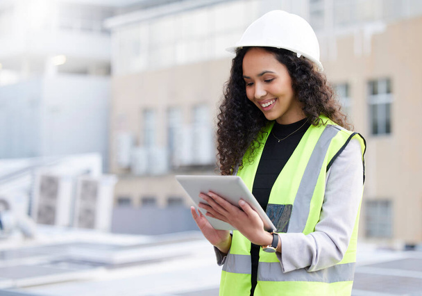 Engineering, tablet and a woman outdoor for planning, search or communication for project. Female engineer with technology in a city for construction, management or app for maintenance and inspection. - Photo, Image