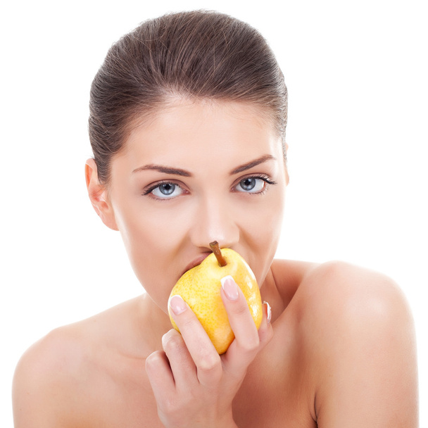 Lovely woman eating pear - Photo, image