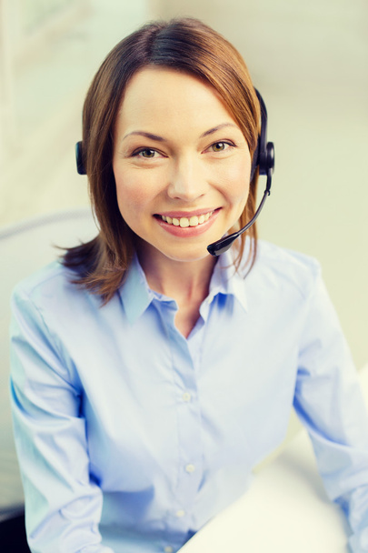 female helpline operator with headphones - Photo, Image