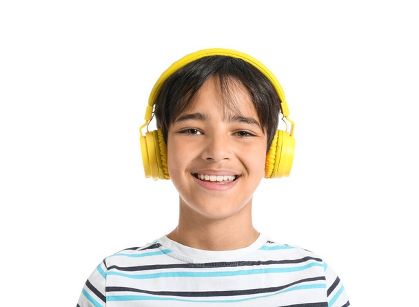 Little boy in headphones on white background, closeup - Photo, Image