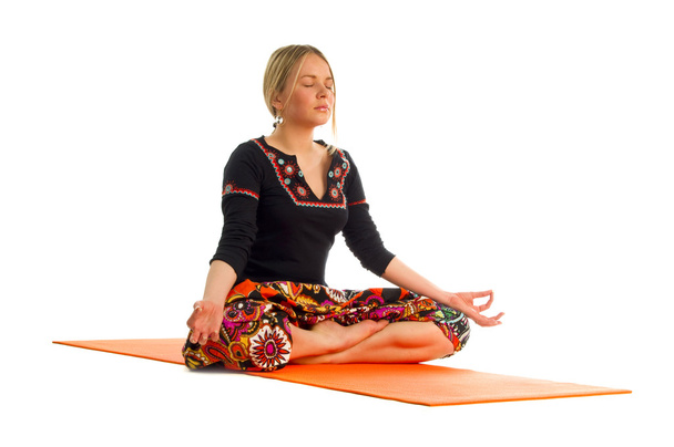 Siddhasana, una posición en Yoga, también se llama pose consumada
 - Foto, imagen