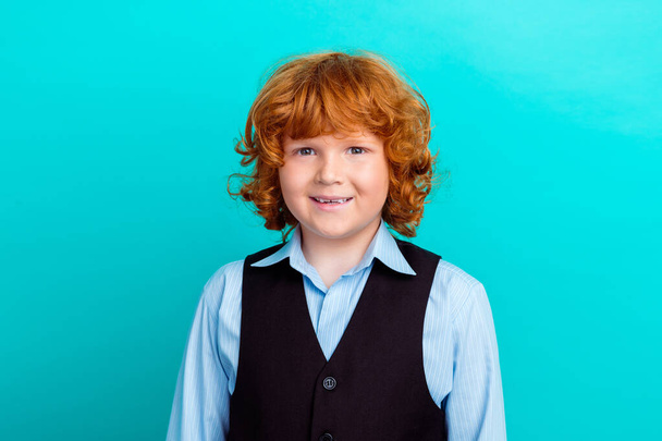 Photo portrait of adorable foxy wavy hair boy toothy smile dressed stylish school uniform outfit isolated on cyan color background. - Φωτογραφία, εικόνα