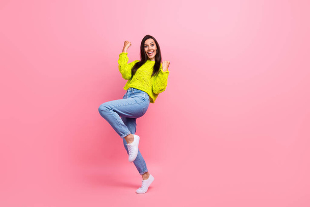 Full length photo of cheerful positive girl wear yellow stylish clothes win lottery shout yes isolated on pink color background. - Фото, зображення