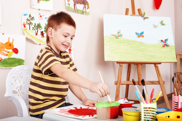 Child paint picture in preschool. - Photo, Image