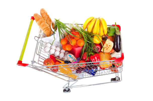 Shopping Trolley of Food on White Background - Фото, зображення