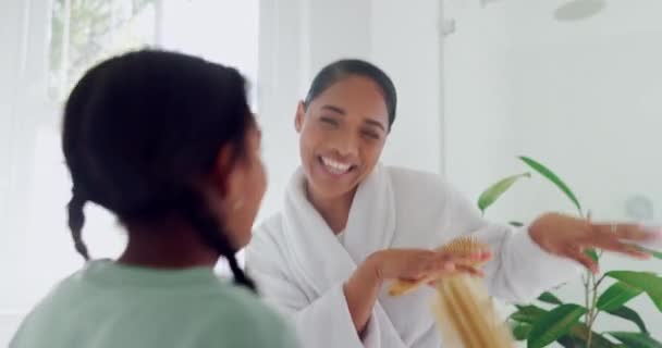 Singing, girl or mother dancing in bathroom grooming or cleaning at home together with music. Happy family, hair brush or fun mom with kid, singer or child bonding to play or relax in morning routine. - Footage, Video