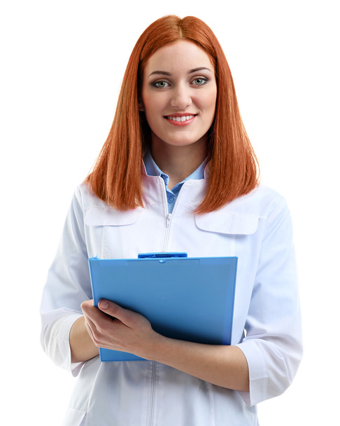 Young beautiful doctor with clipboard isolated on white - 写真・画像