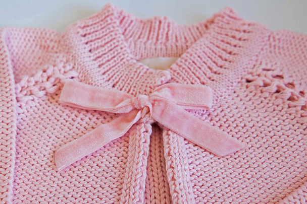 Detail of pink baby blouse made of tricot - Photo, Image