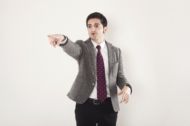Businessman pointing out - Foto, immagini