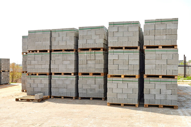 hollow concrete wall blocks assembled on pallets in the workshop - Photo, Image