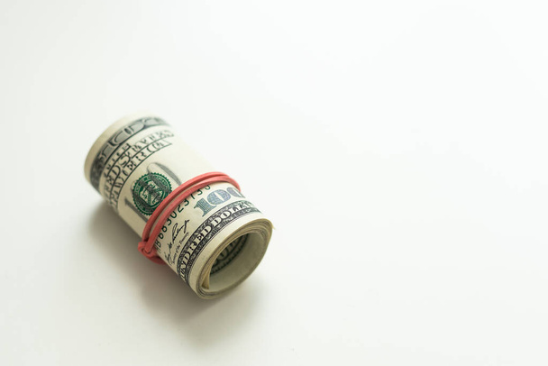 Pénz roll dollár USA fehér háttér. Pénzügyi koncepció. Kiváló minőségű fénykép - Fotó, kép