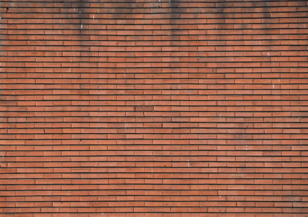 muro di mattoni rossi utile come sfondo - Foto, immagini