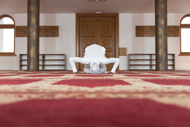 African Muslim Praying In Mosque - Фото, изображение