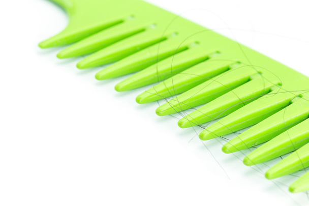 Green comb with hair - Φωτογραφία, εικόνα