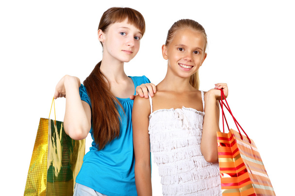 Pretty teenage girls with shopping bags - Foto, Imagen