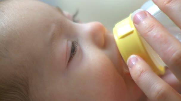 Infant drinking bottle - Footage, Video