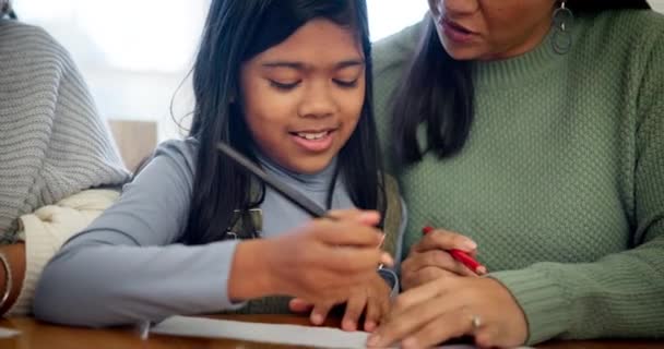 Drawing, grandmother and mother help child writing homework as support or care on a home table together. Learning, development and happy parent with mom teaching kid creativity and growth as student. - Footage, Video