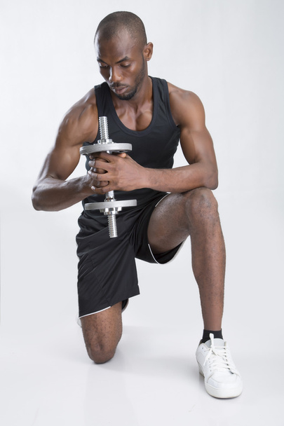 Man lifting weights - Photo, Image