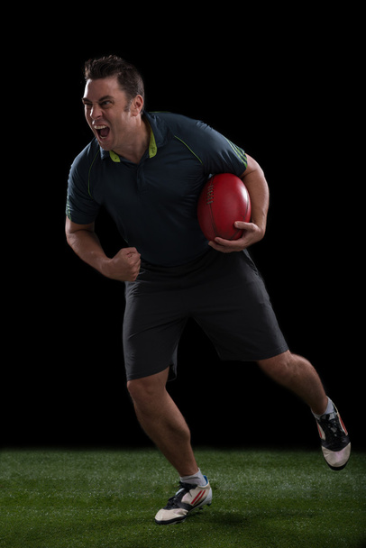 Jugador de rugby gritando
 - Foto, imagen