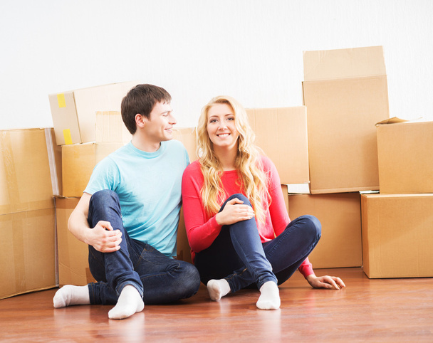 Young couple in new home - Photo, image