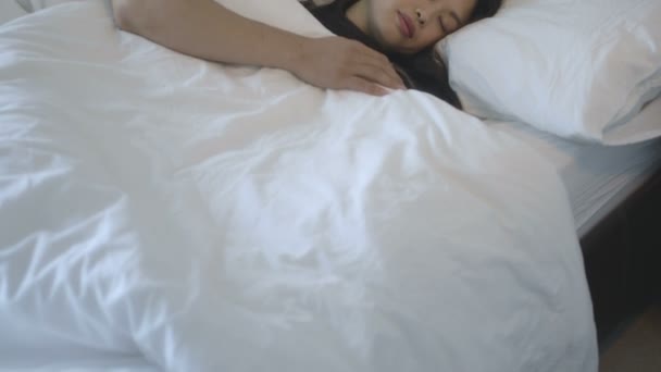 Couple sleeping on bed - Filmati, video