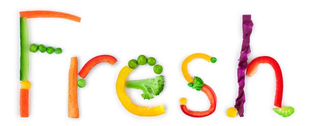 the word "fresh" from pieces of vegetables on white backgroundin - Foto, immagini