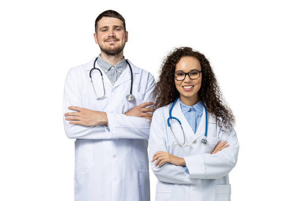 Male and female doctors in white uniform, isolated on white background - Photo, Image