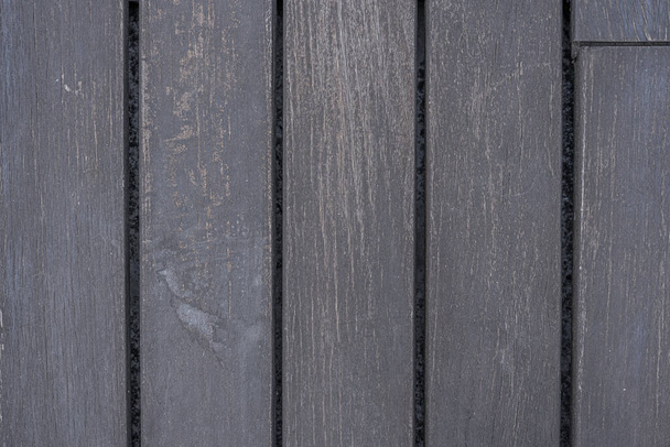 Tmavé nenalakované dřevěné prkna na podlaze terasy. Vektorové dřevo textury pozadí - Fotografie, Obrázek