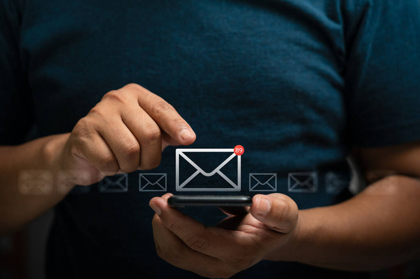 Email marketing concept, Business people use email to promote products or services. online marketing strategy that reach target customers, email newsletter, checking message box, information online. - Photo, Image