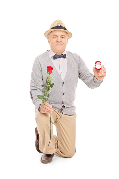 Senior gentleman with engagement ring - Foto, afbeelding