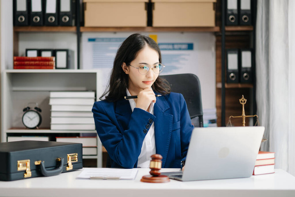 Beautiful asian woman lawyer working  in the office. Advice justice and law concept - Foto, immagini