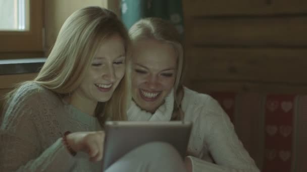 Women using digital tablet - Materiał filmowy, wideo