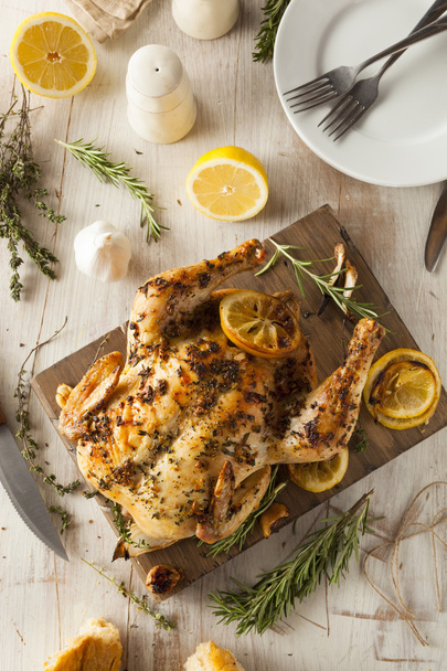 Homemade Lemon and Herb Whole Chicken - 写真・画像