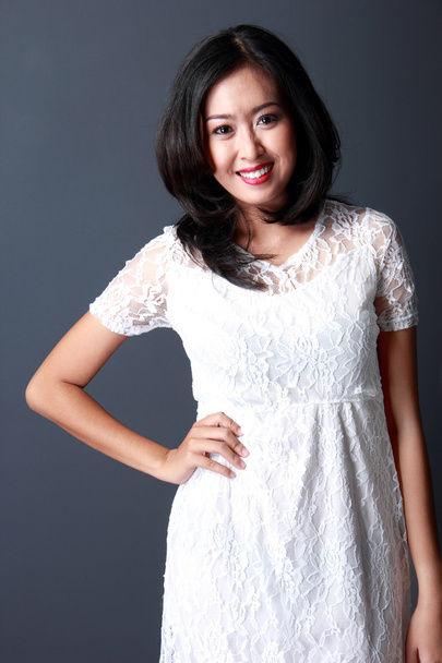young woman wearing white dress - Foto, Bild