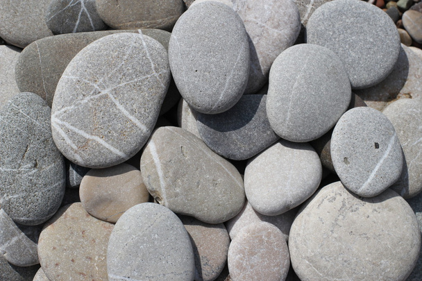 Abstract background with pebbles - round sea stones - Photo, Image
