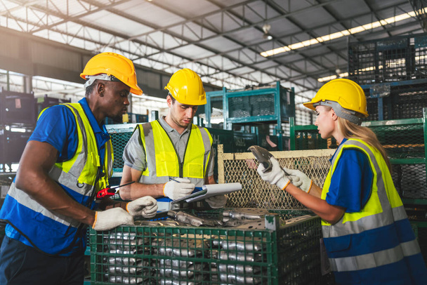 Group of Diverse Warehouse Workers Working Together to Quality Control in Factory, Industrial Management and Teamwork for Optimal Efficiency. - Photo, Image