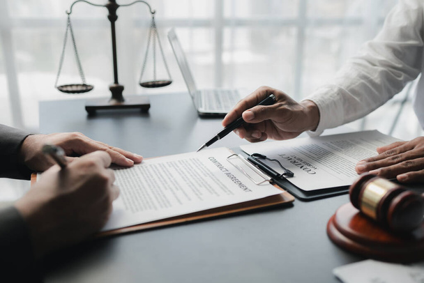 Lawyers give advice to clients and draft contracts. Lawyers seek legal information to plan for representing clients in cases and draft case employment contracts, using the law. Lawyer concept. - Photo, Image