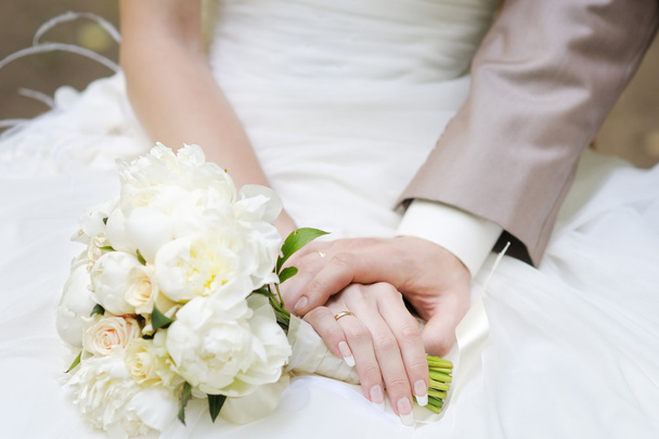 Bride and groom's hands  - Фото, зображення